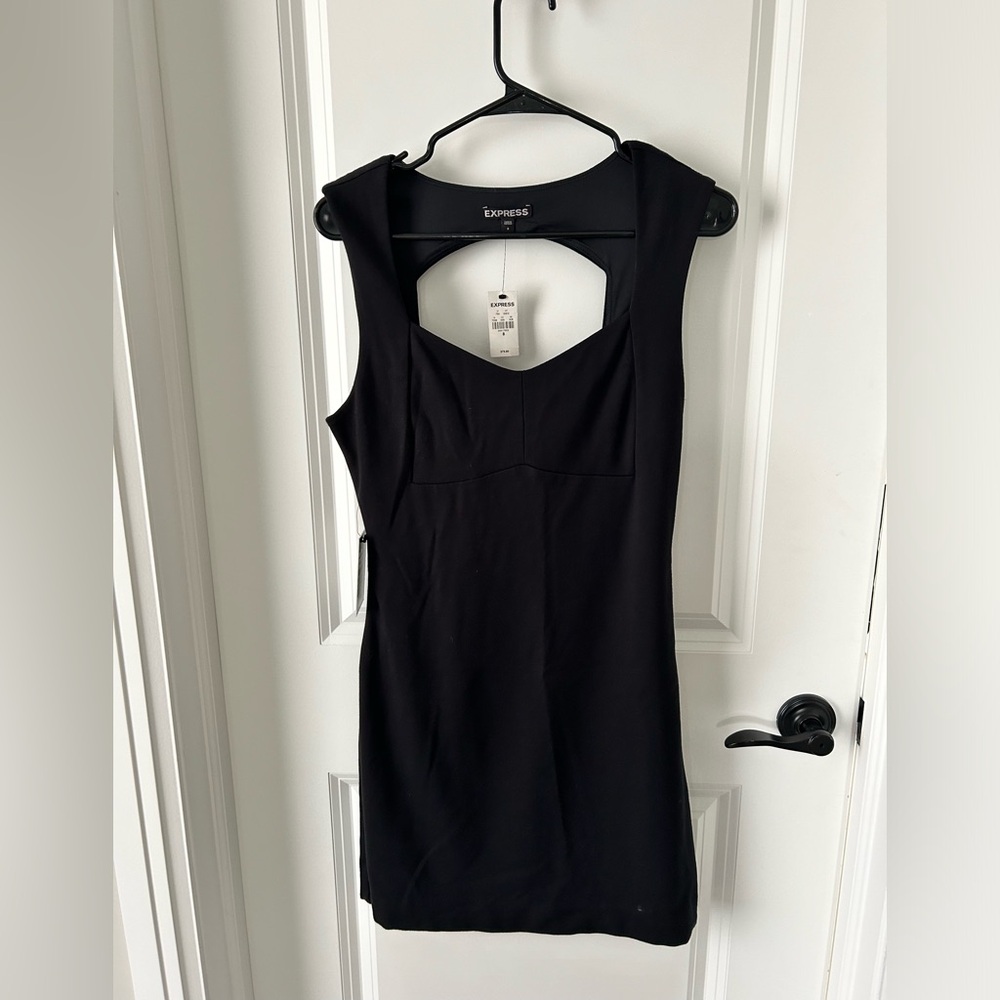 Short black professional dress with open back. Express. New with tags.